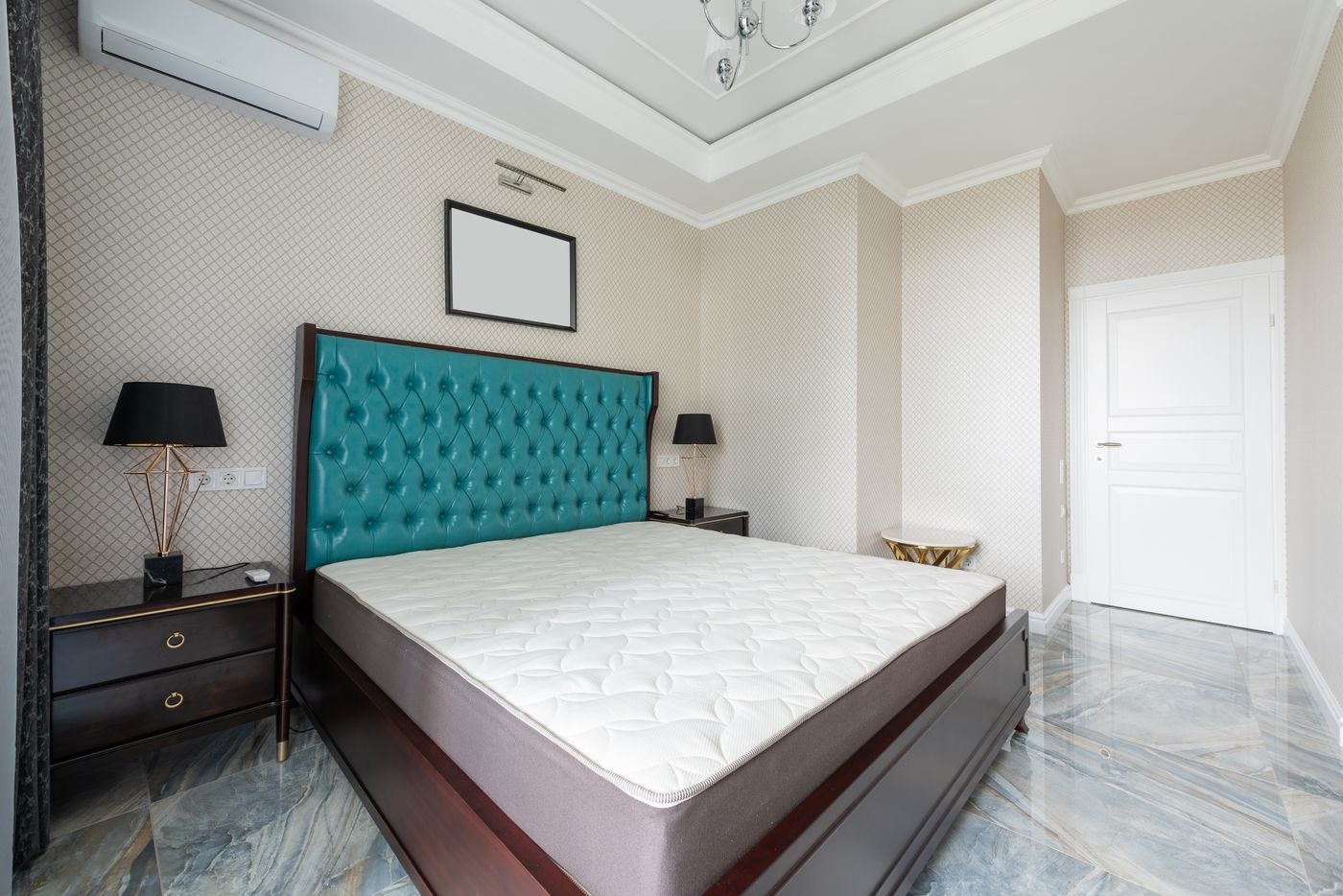 Contemporary bedroom interior with furniture on marble floor