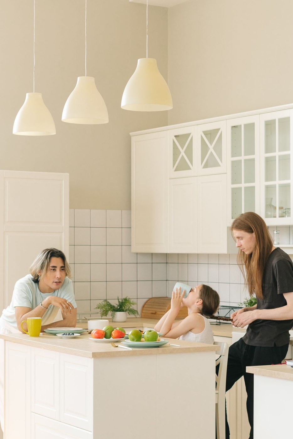 A Family Having Breakfast in the Kitchen Area