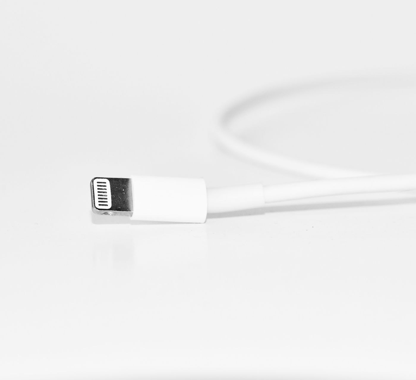 Close-Up Photography of White iPhone Charger