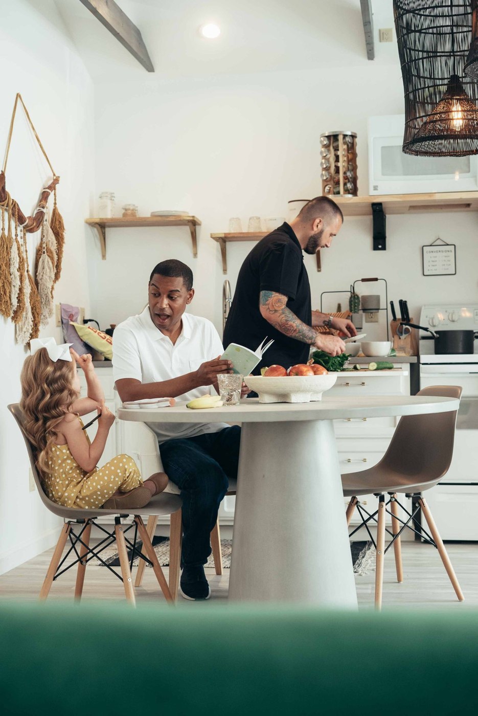 A Father Talking to His Daughter while at the Dining Table