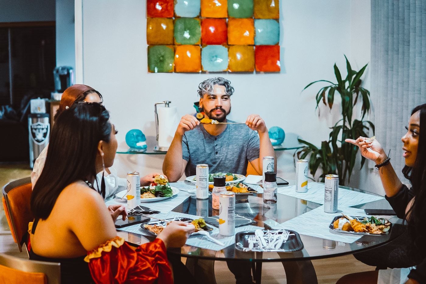 People Sitting at Table at Home Eating